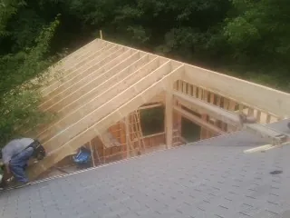 Framing a new roof addition that ties into an existing shingle roof in Clontarf